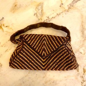 Small beaded brown and tan cocktail purse.